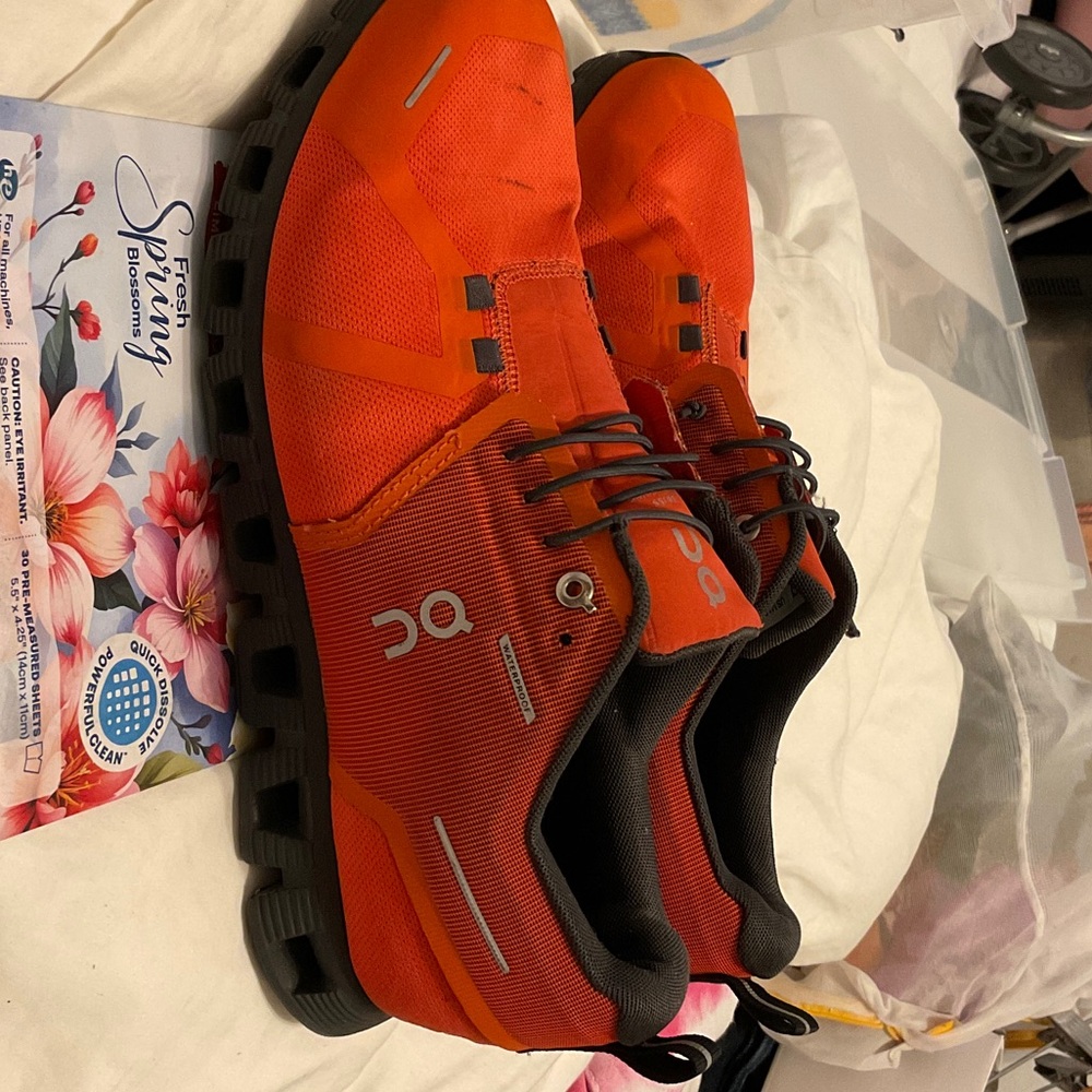 On Running Men’s Athletic Shoes in Bright Orange with Black Soles